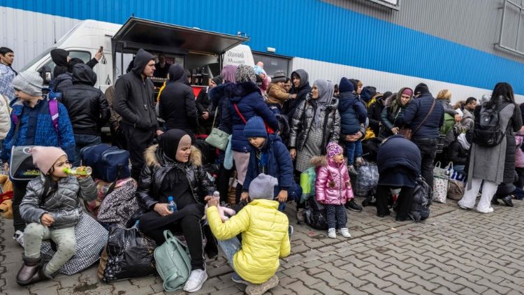 Refugiados ucranianos en frontera de Polonia